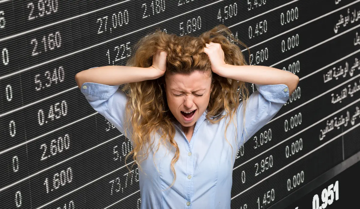 Woman frustrated by 2025 market volatility